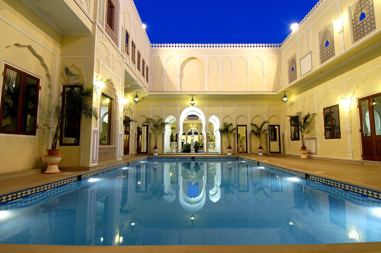 <strong>Raj Palace, Jaipur: </strong>Visitors can choose from 29 unique bedrooms and take advantage of the hotel's luxury swimming pool, spa and dining areas.