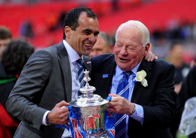 Wigan manager Roberto Martinez, left, celebrates with his chairman Dave Whelan after winning the FA Cup.