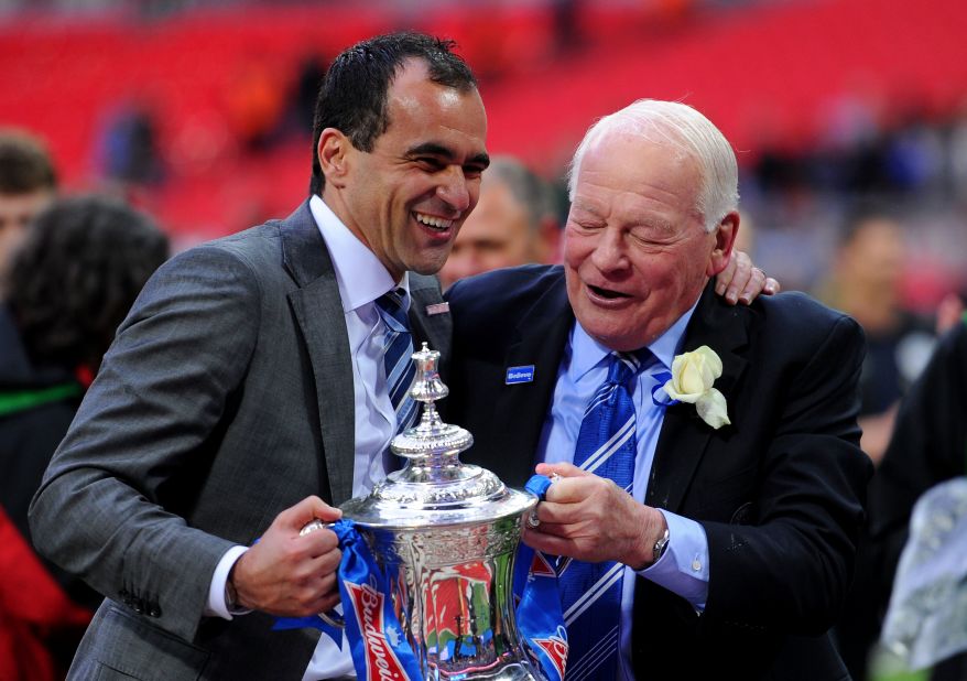 Wigan manager Roberto Martinez, left, celebrates with his chairman Dave Whelan after winning the FA Cup. 