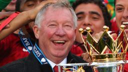 Alex Ferguson with the English Premier League trophy after Manchester United's 2-1 win over Swansea.