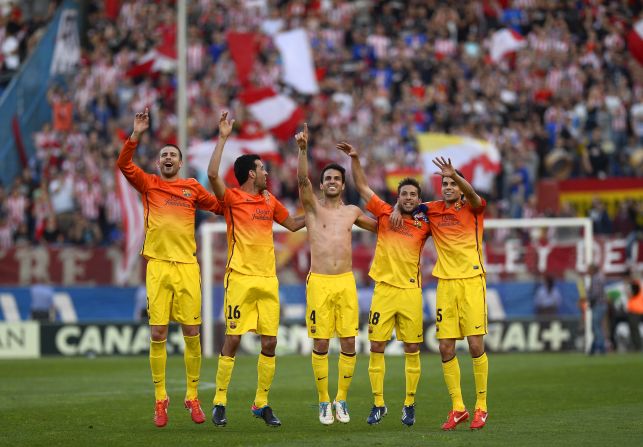 The Barcelona players celebrated a fourth title in five seasons, and 22nd overall -- which was secured when second-placed Real Madrid could only draw with Espanyol the previous day.