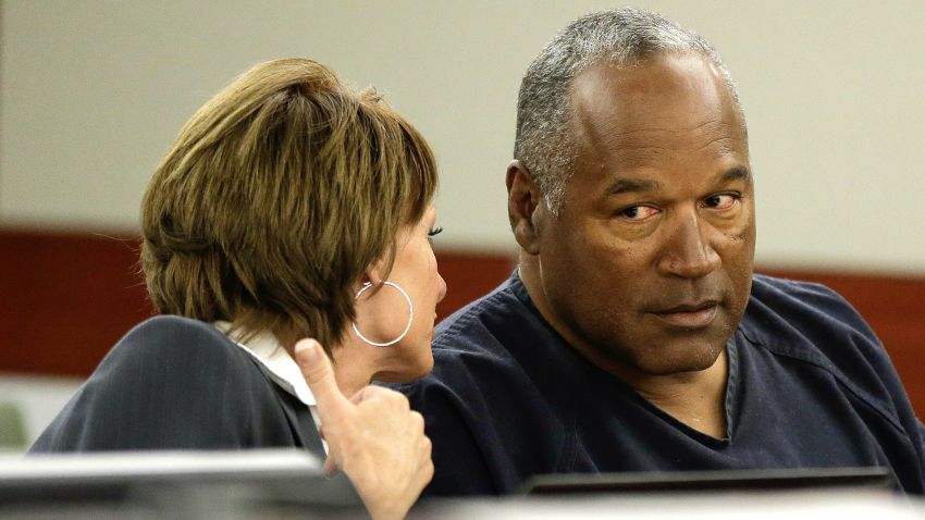 LAS VEGAS, NV - MAY 13: O.J. Simpson (R) talks with his attorney, Patricia Palm during his retrial in Clark County District Court May 13, 2013 in Las Vegas, Nevada. Simpson, who is currently serving a nine to 33-year sentence in state prison as a result of his October 2008 conviction for armed robbery and kidnapping charges, is using a writ of habeas corpus, to seek a new trial, claiming he had such bad representation that his conviction should be reversed. (Photo by Julie Jacobson - Pool/Getty Images)