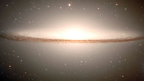 The Sombrero Galaxy is thought to house a black hole, a gravitational field Davies says could lead to the future, but not the past.