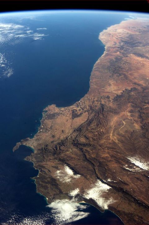 This photo shows "the <a href="https://twitter.com/Cmdr_Hadfield/status/333846272823947264/" target="_blank" target="_blank">southwest corner of Africa</a>, from space."