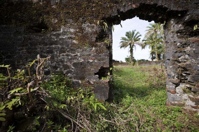 "The wall here is about 16 feet and it goes down almost to 40 feet as the land drops," says Opala. "But if you had come here during the dry season months, say in the 1750s, you would have seen this whole area filled with people."