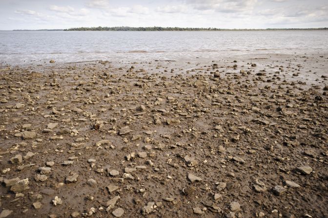 Historian Joseph Opala says that when the human cargo was loaded onto the ships, the slave traders took off the ballast they'd brought from England -- pebbles of English flint that are still scattered all over the island's shores.  "If you put it in your hand and weigh it, you can feel the weight of the human beings put on the ship, as these items were thrown off," says Opala.