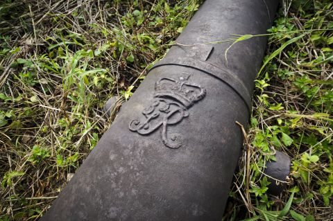 A cannon with the crest of King George III found on Bunce Island.