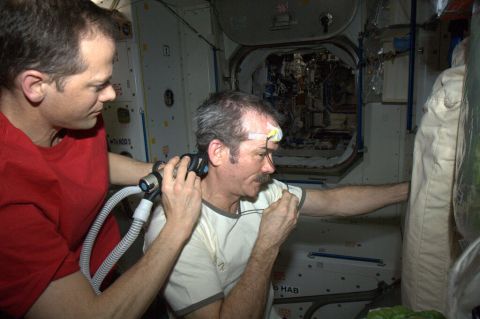 Hadley got a <a href="https://twitter.com/Cmdr_Hadfield/status/320960647728873473" target="_blank" target="_blank">space haircut</a> as depicted in this April 7 photo. "Dr. Tom doing a nice, surgical job of trimming, working around the science experiment (temperature) sensor," Hadfield tweeted.