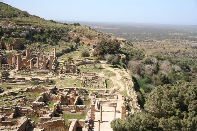 The ruins of Cyrene reflect enduring Greek influences on language and architecture in Libya; its Temple of Zeus is larger than the Parthenon in Athens. The site is about 120 miles (nearly 200 kilometers) east of Benghazi.