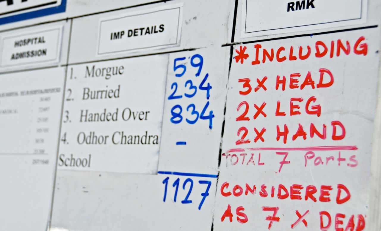 A white board at the recovery command center near the disaster is used to track the death toll on Monday, May 13.