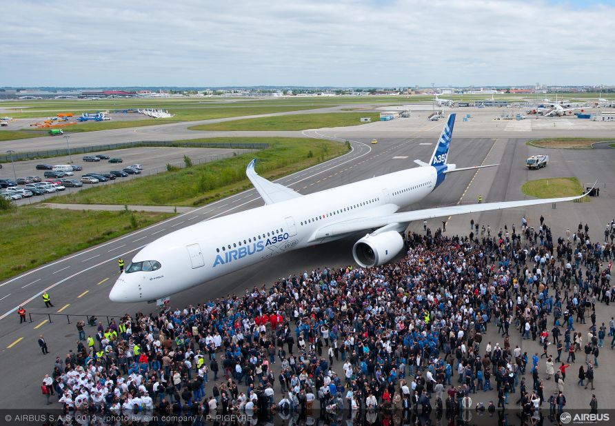 Who's a pretty boy then? Airbus' first completed A350 XWB is unveiled with a full paint-job in Toulouse, France on May 13, 2013. The plane is set to rival Boeing's 787 Dreamliner in the mid-size aircraft market. 