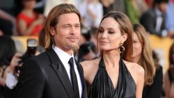 LOS ANGELES, CA - JANUARY 29:  (L-R) Actor Brad Pitt (L) and actress Angelina Jolie arrive at the 18th Annual Screen Actors Guild Awards at The Shrine Auditorium on January 29, 2012 in Los Angeles, California.  (Photo by Jason Merritt/Getty Images)