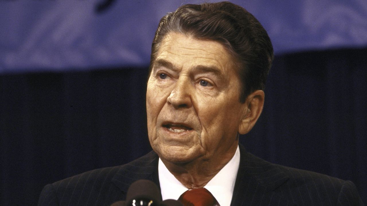 Reagan speaking to the press during Iran-Contra hearings.  