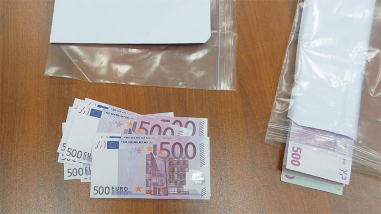 One photo released by the FSB shows what appears to be a large quantity of high-denomination euro currency notes.
