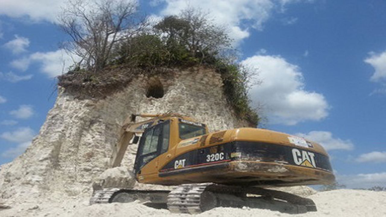 The 2,300-year-old Mayan pyramid at Noh Mul was destroyed to make fill for roads in Belize, local media report.