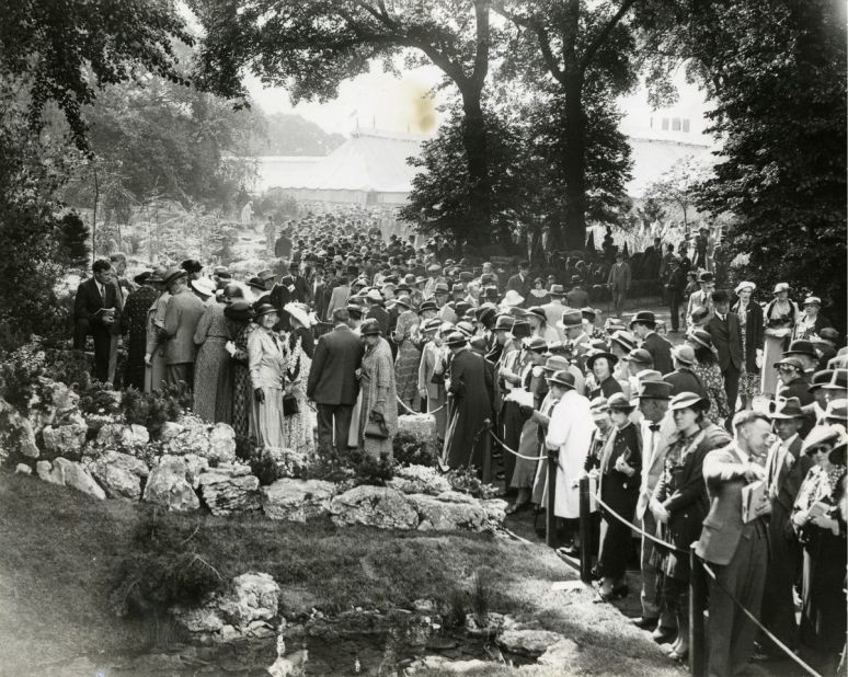 Chelsea Flower Show has always been popular with the crowds, as this 1936 photograph shows. In 1979 turnstiles were introduced to prevent overcrowding and a ceiling has since been put on the number of tickets sold. 