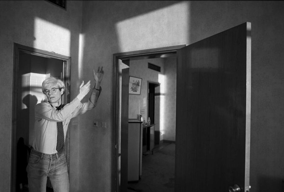 In his hotel room in Beijing, Warhol tried poses inspired by the many people he observed  practicing tai chi outdoors.