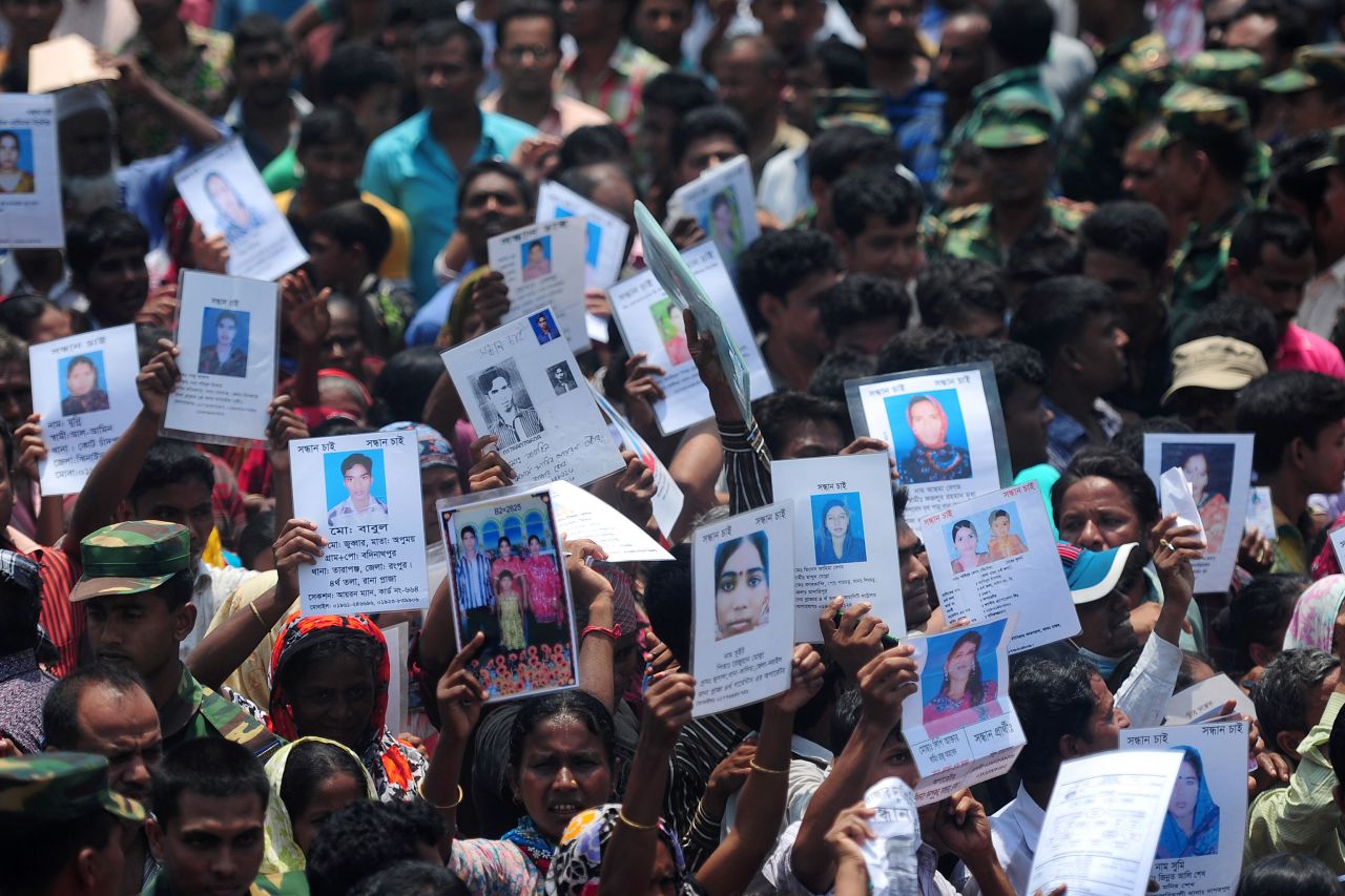 Family members of missing workers march on May 14. The Bangladeshi army has wrapped up its search for bodies.