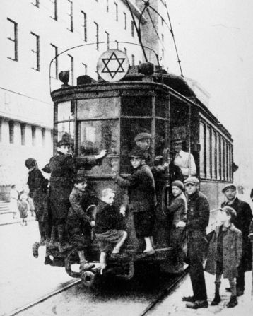 Children ride on a "Jewish-only" tram in Warsaw'. This photo was taken circa in 1940, before the ghetto was officially established. However, strict rules for Jewish people in Warsaw were already in place in 1940.