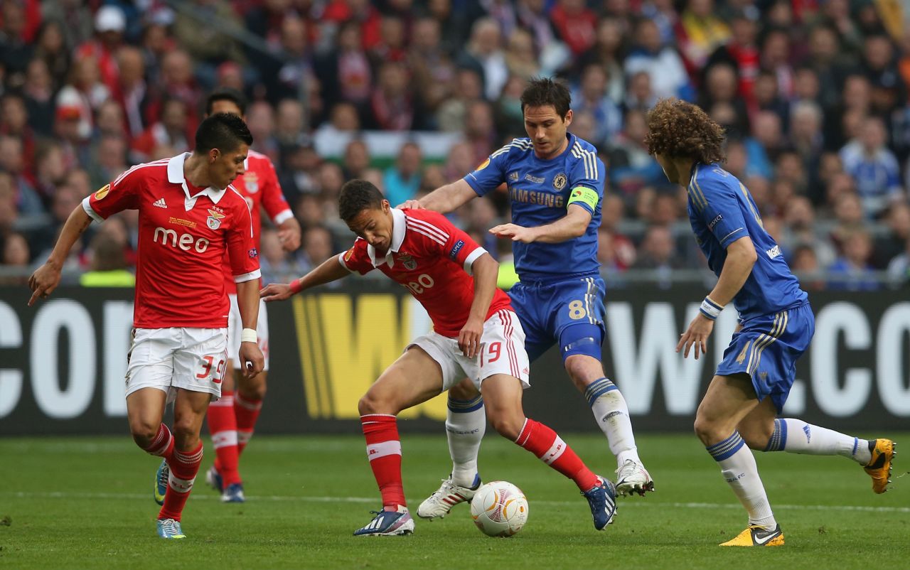 Frank Lampard and David Luiz watch on Rodrigo wins control of the ball for Benfica. The Portuguese side dominated the opening half but failed to find a breakthrough.
