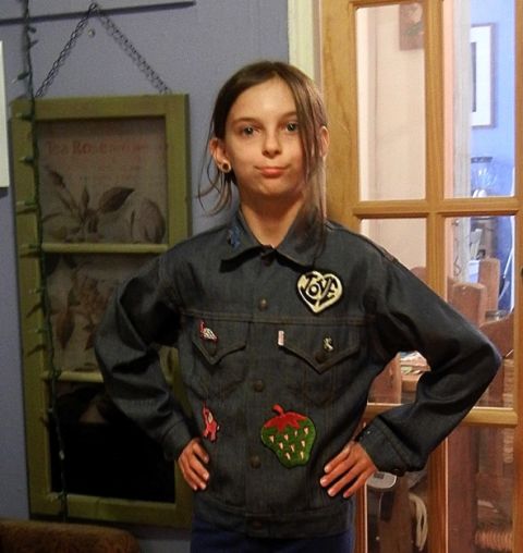 Just about every '80s kid in America <a href="http://ireport.cnn.com/docs/DOC-966292">had a jean jacket</a>, preferably with patches, pins or rhinestones. In 1983, when Beth Barret was 13, her mom bought her this jacket and her grandmother sewed the patches. Barret's daughter, shown here in May, often wears it now.