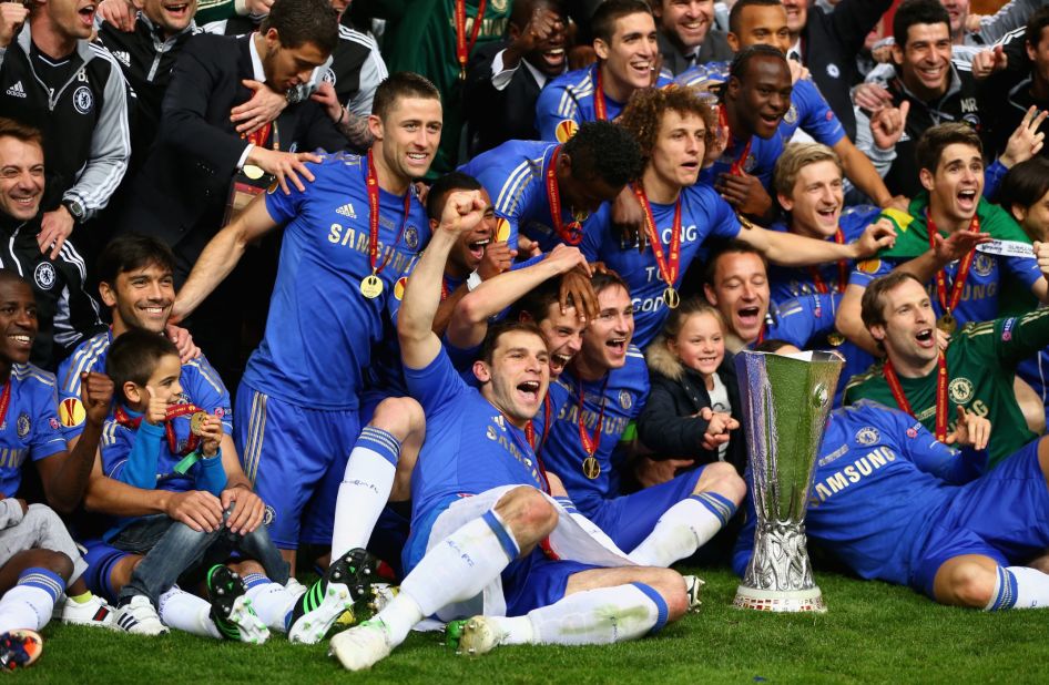 One year on from winning the Champions League, Chelsea's players celebrate with the Europa League trophy.