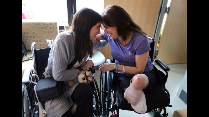 Sydney Corcoran and her mother Celeste, a day before Sydney's discharge from Boston's Spaulding Rehabilitation Hospital. Celeste Corcoran had to have both of her legs amputated.