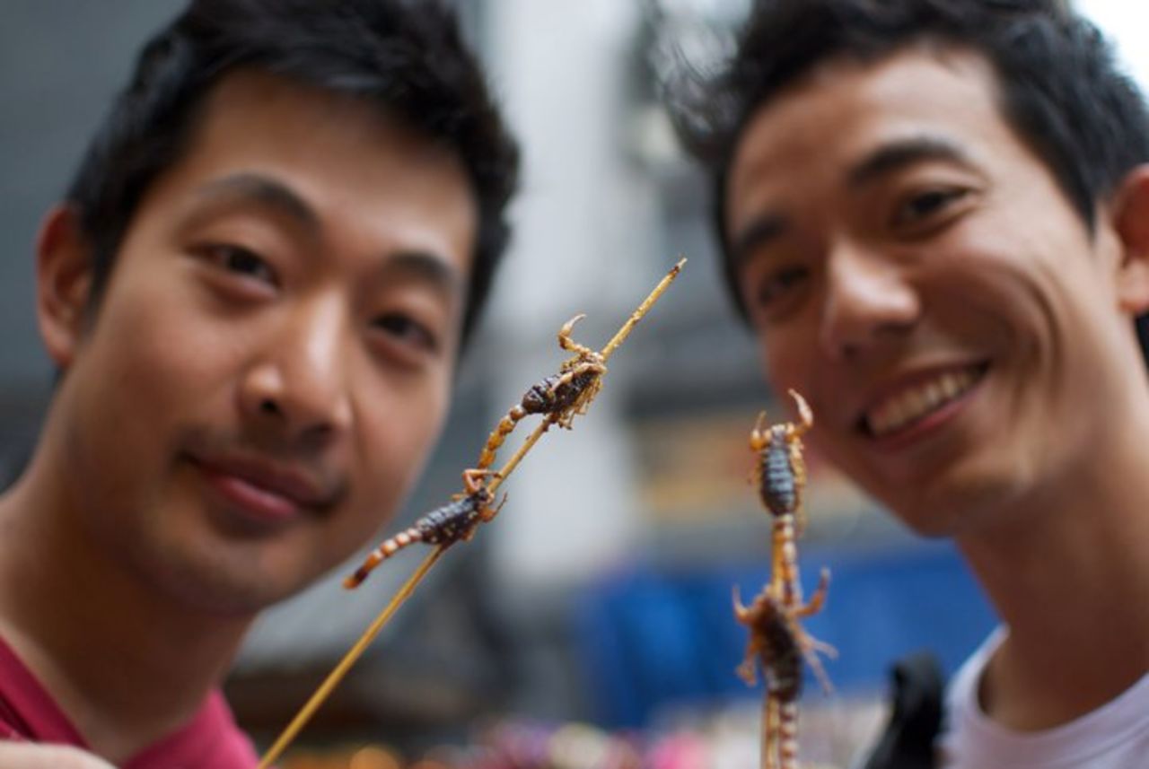 Although scorpions aren't technically 'insects,' they still made it onto the U.N. report. They're more of a tourist draw than conventional Chinese cuisine, and can be found at <a href="http://travel.cnn.com/shanghai/life/5-extreme-foods-at-beijing-night-market-294439">street stalls dotting Beijing's major shopping street of Wangfujing</a>. "They taste like anything deep-fried -- crunchy and oily but no real flavor," says Soon Ho Lee, one of the adventurous tourists in this photo (left). 