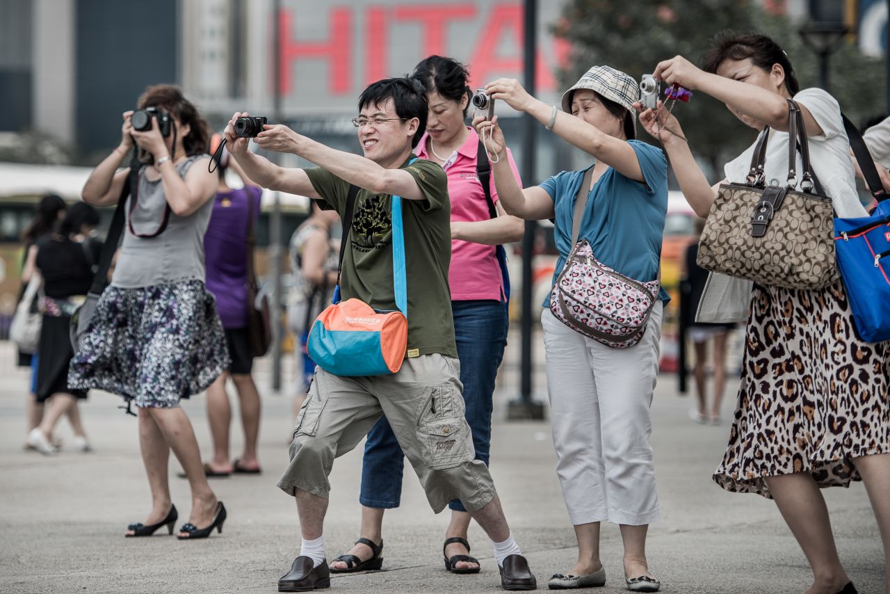 Chinese tourism industry officials say the new tourism law has already led to a decrease in the number of tour bookings.   