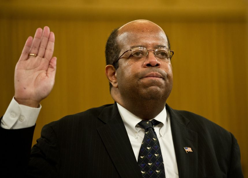Treasury Inspector General for Tax Administration J. Russell George is sworn in before testifying in Washington in May 2013. According to his report, the IRS developed and followed a faulty policy for determining whether applicants were engaged in political activities, which would disqualify the groups from receiving tax-exempt status.