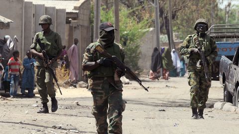 Nigerian troops patrol the streets of the remote northeast town of Baga, in Borno State, on April 30.