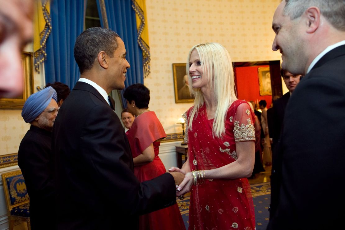 President Barack Obama shakes hands with Michaele and Tareq Salahi (R) at the receiving line in the Blue Room as he hosts the State Dinner in the State Dining Room of the White House on November 24, 2009 in Washington, DC.