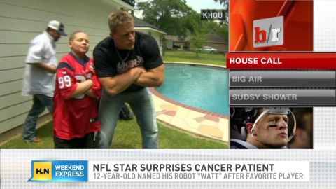 J.J. Watt hanging out with a cancer patient and fan in 2013.