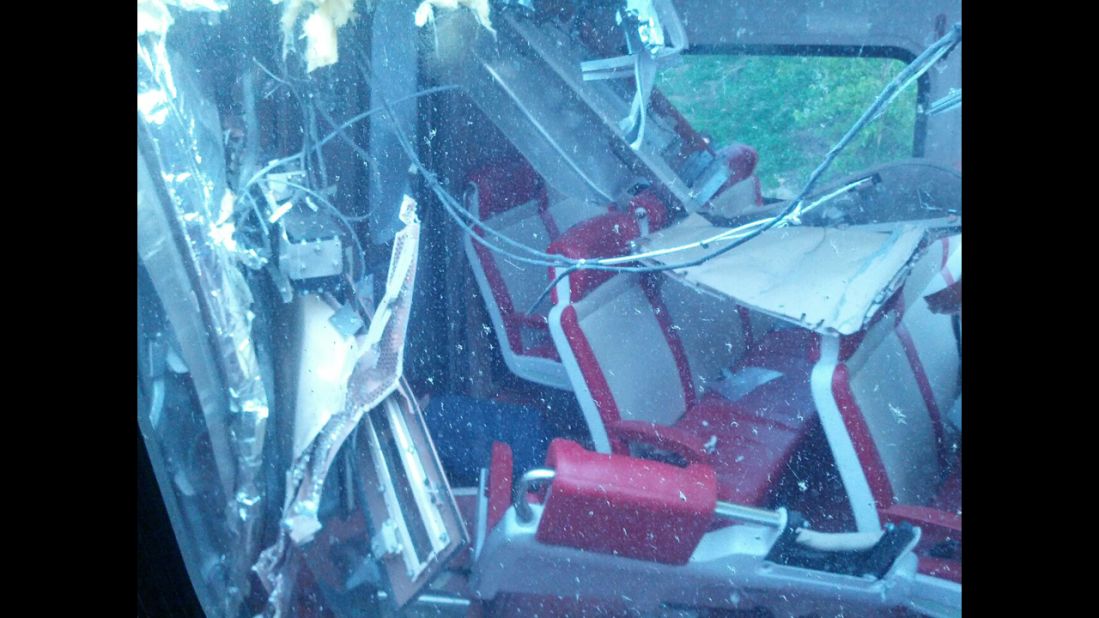 Debris and twisted metal is seen inside one of the derailed trains on May 17.