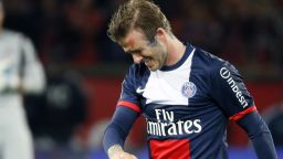 The emotion shows as David Beckham walks off the field after his late substitution at the Parc des Princes.