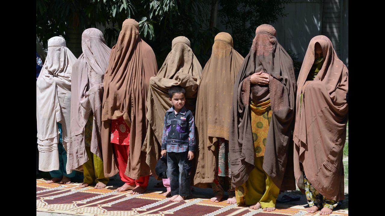Female supporters of Pakistani Prime Minister-elect Nawaz Sharif offer special prayers for the victory of their party  in Peshawar on Friday, May 17.  