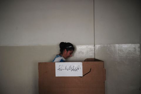 A Pakistani woman casts her ballot in Karachi on May 19.