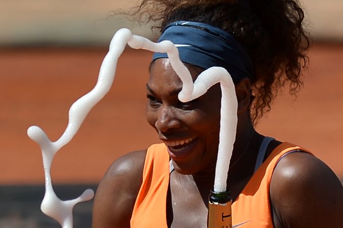 Serena Williams enjoys another champagne moment during her sparkling clay court season.