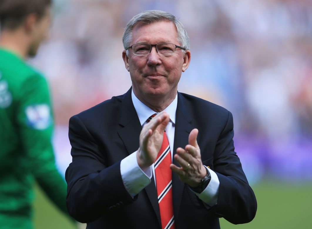 Alex Ferguson applauds the crowd as he says farewell after his 1500th game in charge of Manchester United.