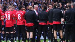 Alex Ferguson receives a guard of honor from his Manchester United players to mark his 1500th and final game in charge of the new EPL champions. 