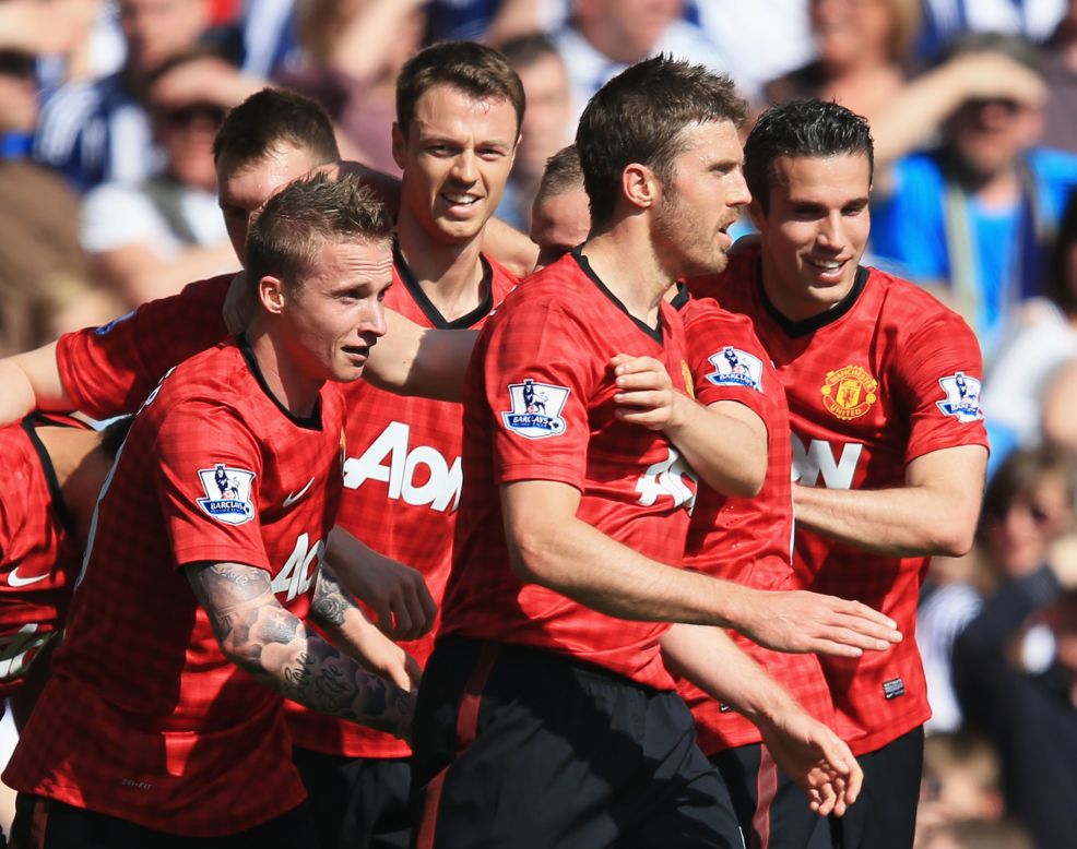 Manchester United's triumphant players celebrate Alexander Buttner's goal to put them 3-0 ahead at the Hawthorns.