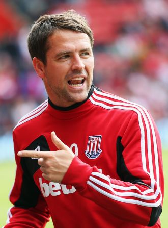 Michael Owen warms up before making a late appearance as a substitute for Stoke in his farewell to top flight football.