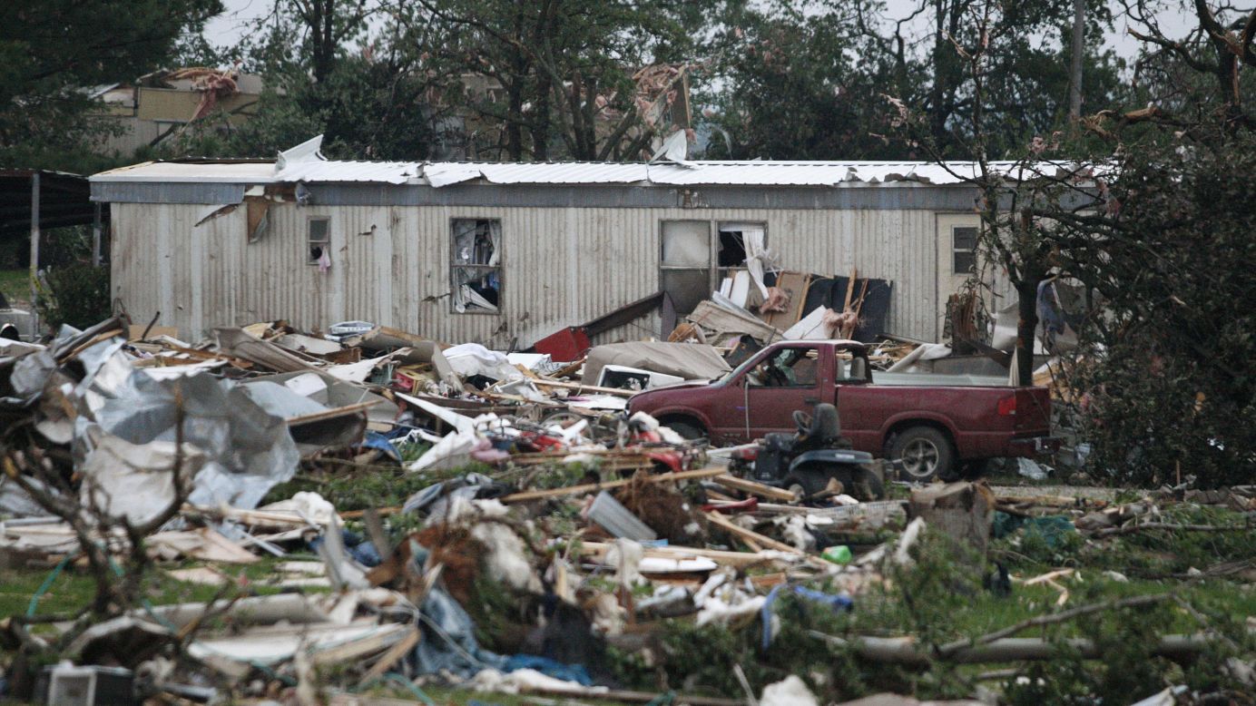 Debris from a mobile home park west of Shawnee litters the ground on May 19. An estimated 300 homes were damaged or destroyed across Oklahoma, Red Cross spokesman Ken Garcia said.