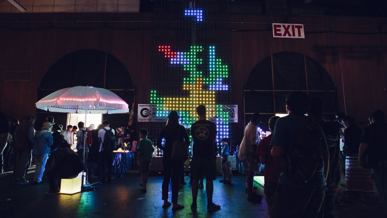 Visitors play a giant game of Tetris in the dark on this display from Oakland's Funhouse Productions. 