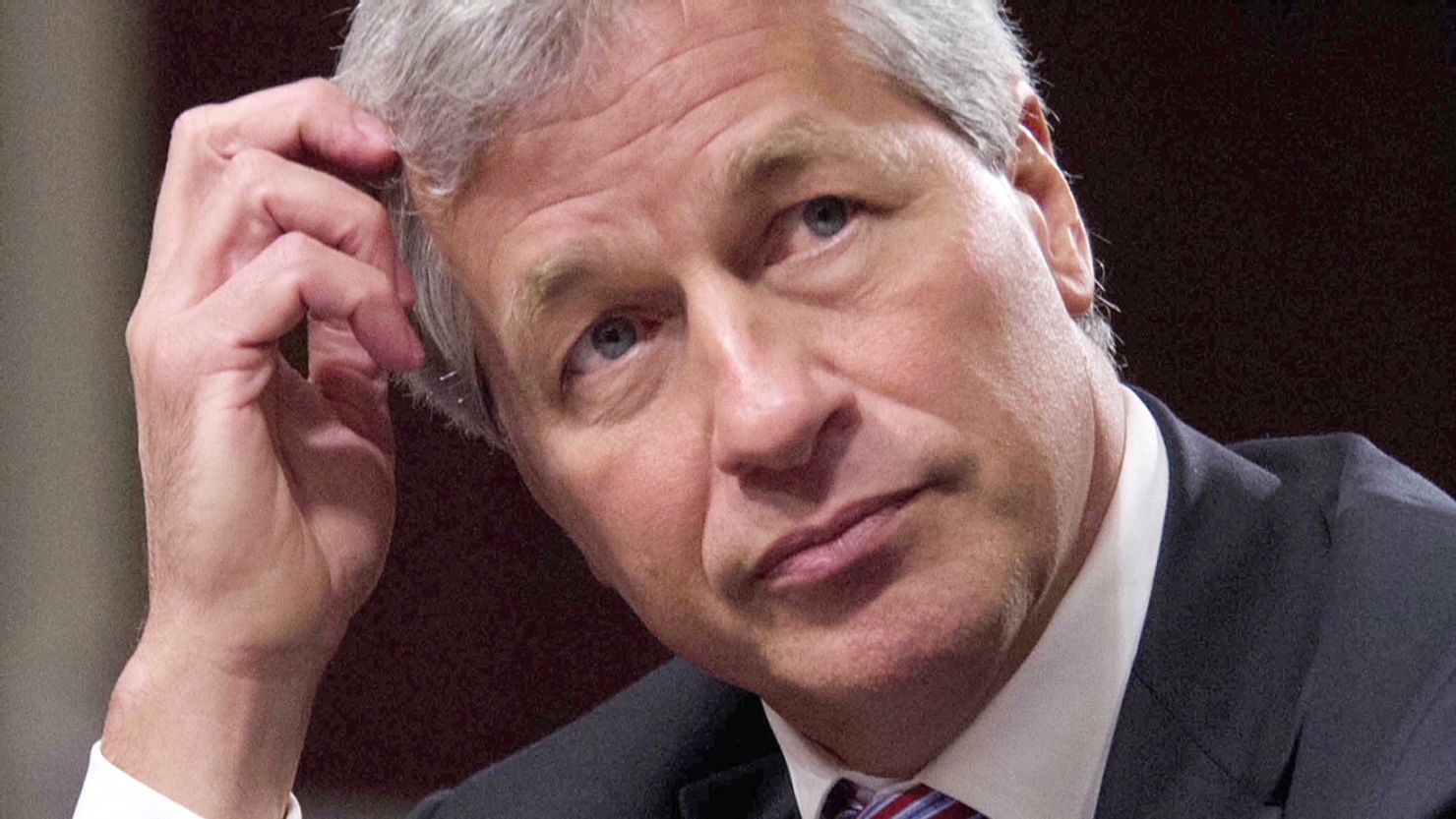 Pay of top bankers, including JPMorgan's Jamie Dimon, dropped an average of 10% last year, according to the Financial Times.