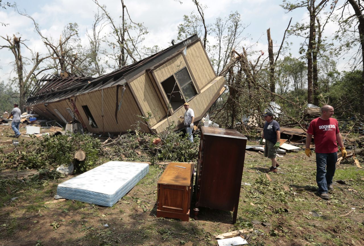 Jean McAdams' mobile home near Shawnee, Oklahoma, lies overturned on May 20.