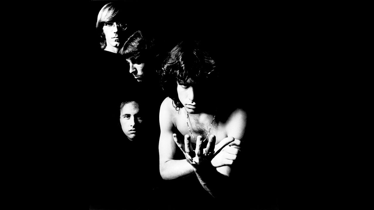 From left, Manzarek, Robbie Kreiger, John Densmore and Jim Morrison pose in the studio. The Doors formed in 1965 after Manzarek happened to meet Morrison on California's Venice Beach.