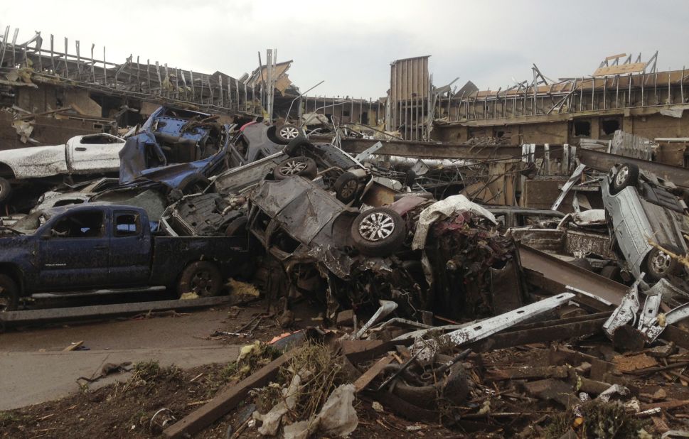 Extensive damage from the tornado destroyed cars and demolished structures in Moore on May 20.