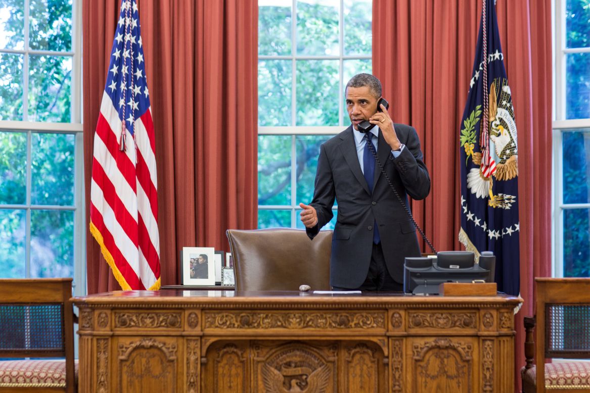 President Barack Obama talks on the phone with Oklahoma Gov. Mary Fallin from the Oval Office on May 20. The president expressed his concern for those who have been affected by the severe weather.