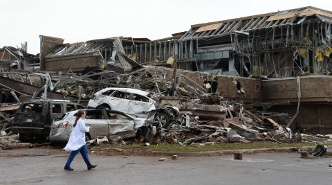 A nurse walks by the destruction at a Moore hospital on May 20.